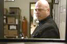 Michael Chiklis and Jason Statham in Parker